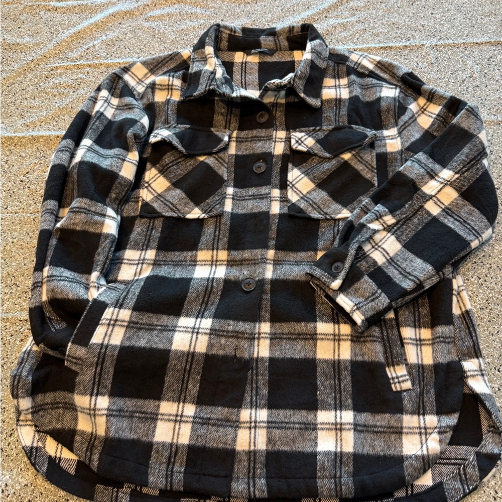 Black and white plaid shacket. Size L. Brand new never worn.  Soft material.
